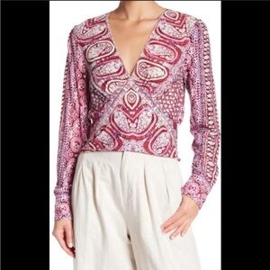 FREE PEOPLE slightly cropped long sleeve blouse!